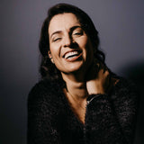 Will jaw exercises work featuring woman smiling.